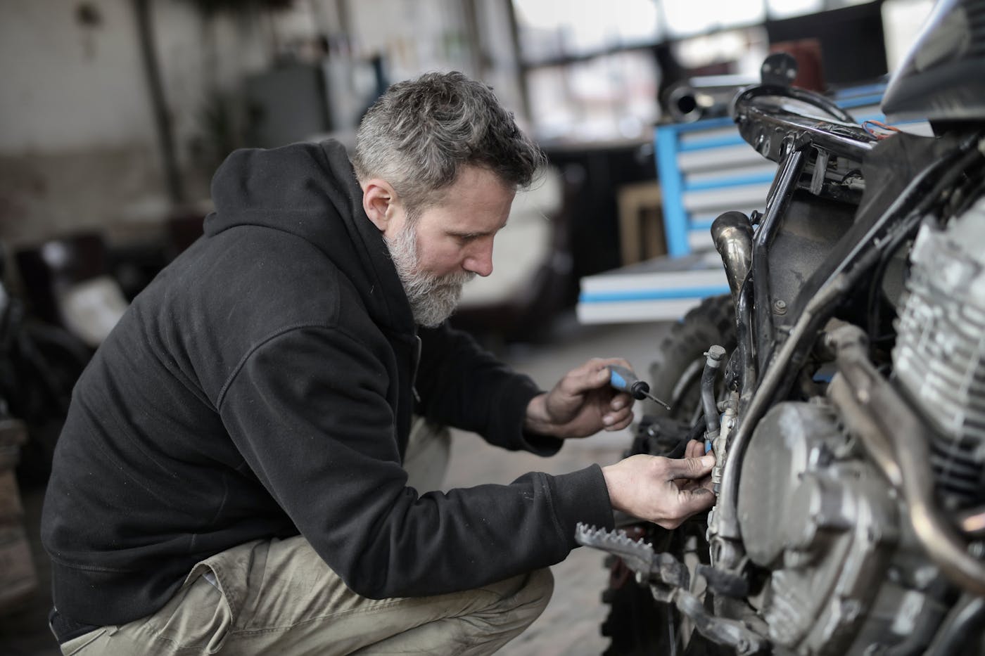 Auto electrician working on a vehicle